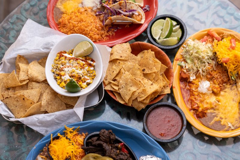 Tacos, enchiladas, chips, and street corn shot during a session at La Posta de Mesilla
